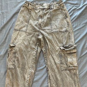 Gray acid wash cargo-style jeans